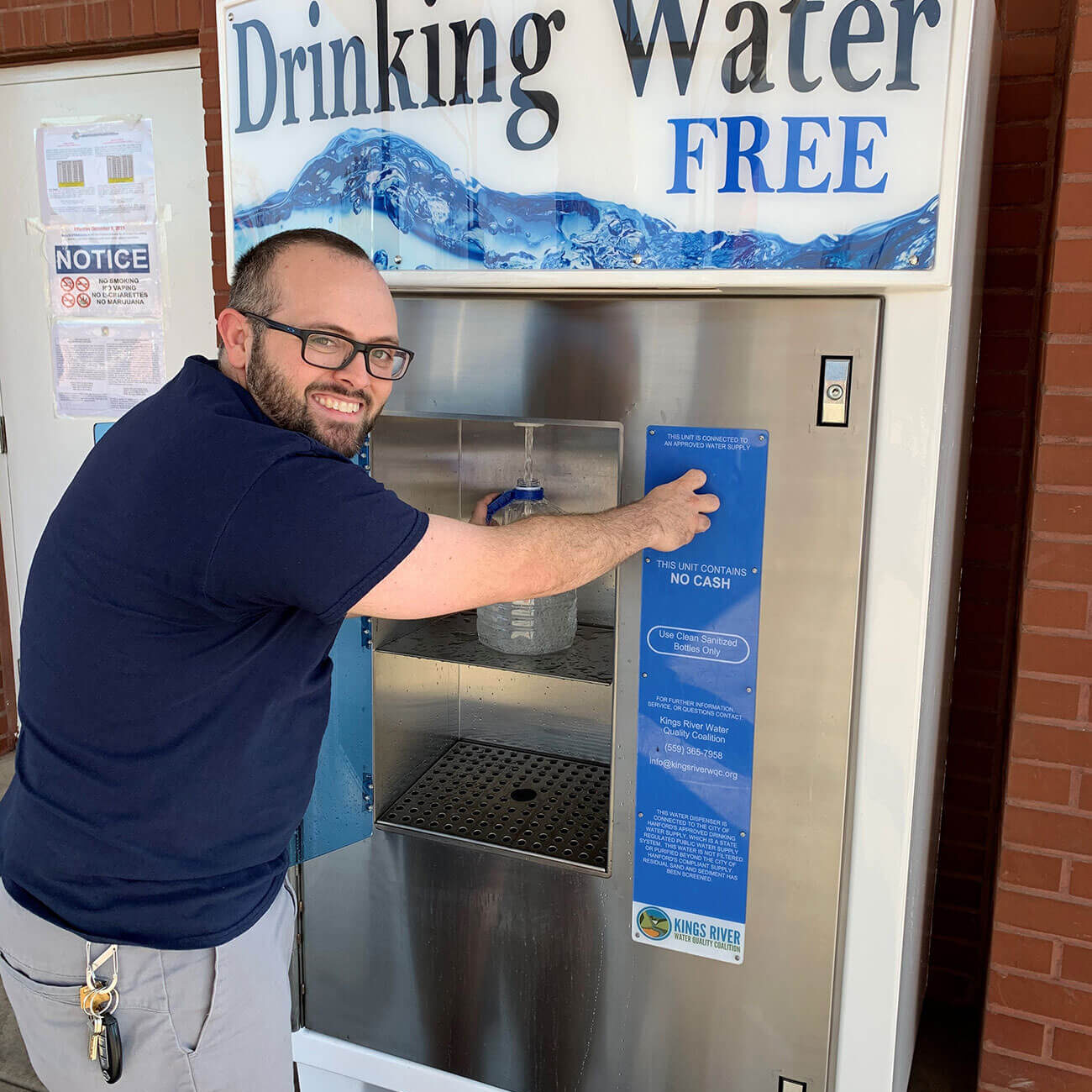 KRCD staff filling up water bottle at Kerman fill station