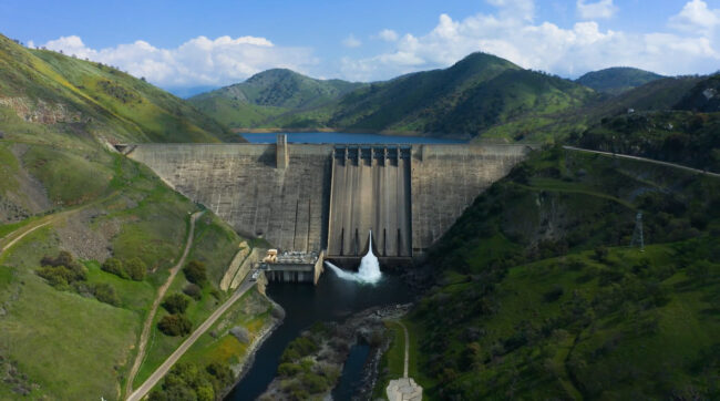Dam & power plant-high downstream angle Aerial view of Pine Flat Dam and the Jeff L. Taylor Pine Flat Power Plant on the Kings River, in Piedra, CA.